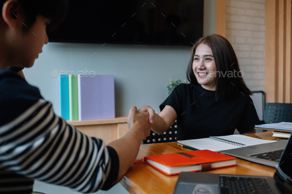 business people handshake for teamwork of business merger and acquisition. - Stock Photo - Images