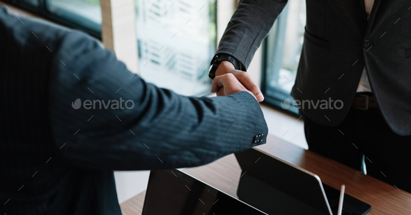 Businessman handshake for teamwork of business merger and acquisition,successful negotiate,hand - Stock Photo - Images