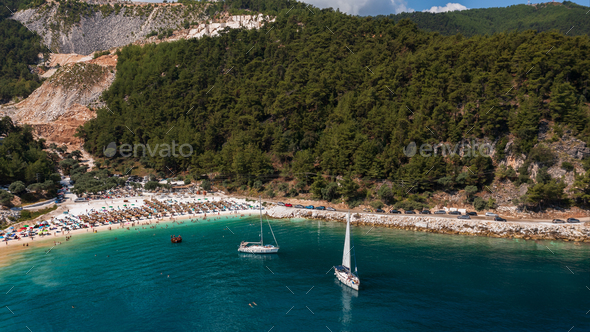Top aerial view of famous Marble beach ai Thassos island, Greece - Stock Photo - Images