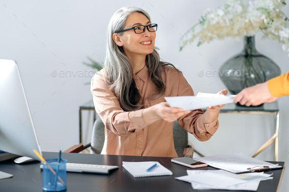 woman business lady mature resume work gray hair interview hiring