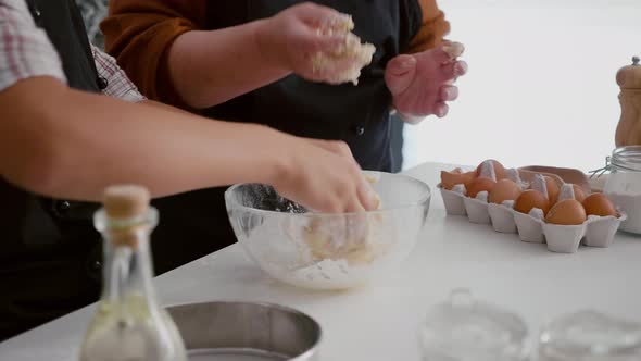 Closeup of Granddaughter Hands Preparing Homemade Traditional Cookies Dough alt