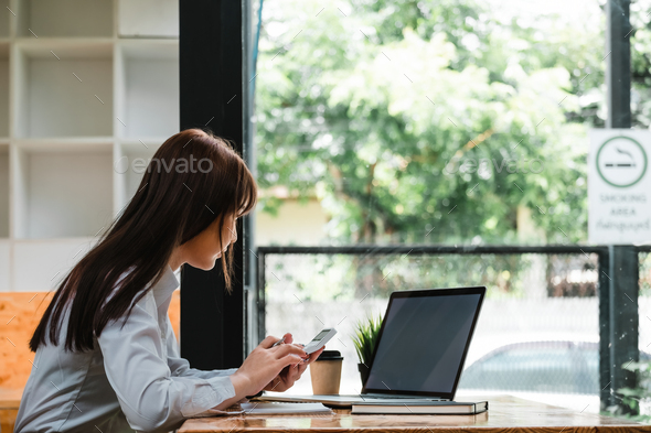 Business accounting concept, Business woman using calculator with computer laptop, budget and loan - Stock Photo - Images