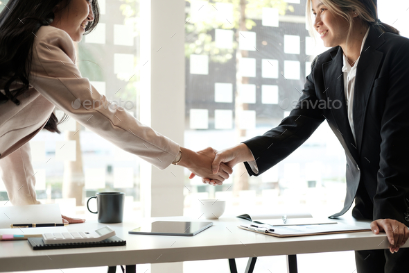 Business Partnership concept. businessman shaking hands finishing up a meeting,acquisition concept. - Stock Photo - Images