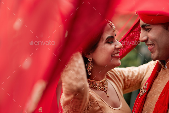 We waited so long for this day. Cropped shot of a young hindu couple on their wedding day.