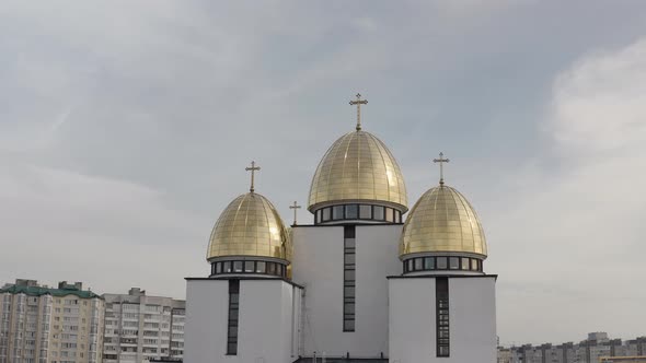 Dome of the Church Aerial View Traditional Old Church in Lviv Ukraine City Cloudy Blue Sky alt