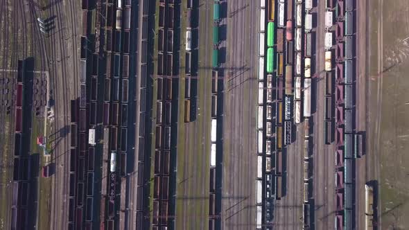 Aerial View of Railway Sorting Station and A Lot of Wagons at a Railway alt