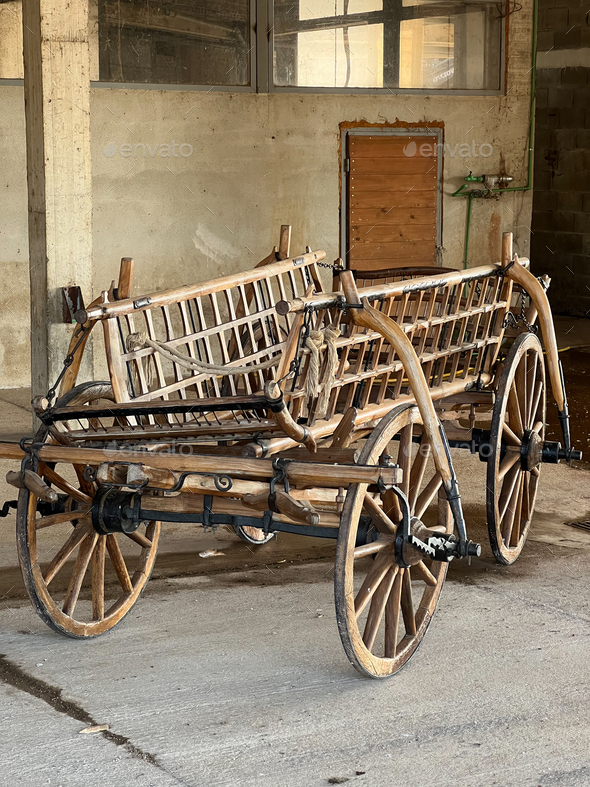 Wooden horse cart stands in the garage Stock Photo by Nadtochii PhotoDune