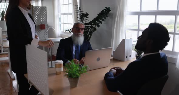 Trading teamwork meeting inside  office doing blockchain research alt