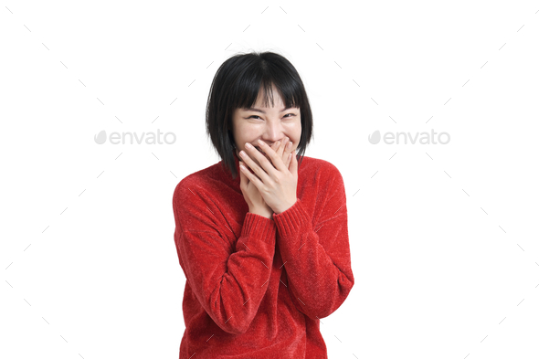 Young asian woman laughing and giggle covering mouth with hands, isolated.