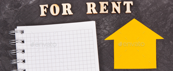 Inscription for rent, home shape and notepad, renting house or flat concept - Stock Photo - Images