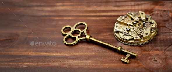Old key with pocket watch, escape room game banner