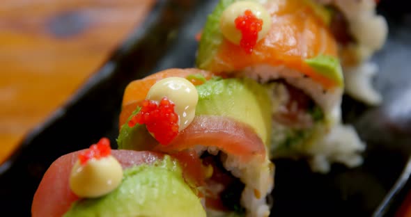 Sushi with rice roll served in a tray 4k alt