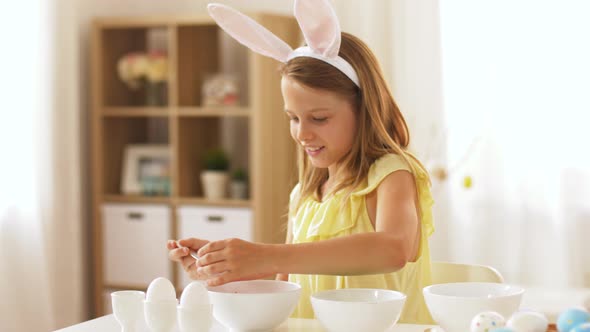 Girl Coloring Easter Eggs By Liquid Dye at Home 8 alt
