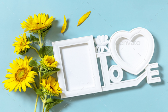 Picture frame, Sunflower photo frame with copy space on pastel blue ...