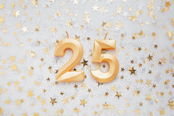 Number 25 twenty five golden celebration birthday candle on Festive Background Stock Photo by Number 25 twenty five golden celebration birthday candle on Festive Background Stock Photo by