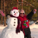 Woman Poses With Snowman Woman Poses With Snowman - VideoHive Item for Sale