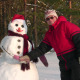 Woman Poses With Snowman Woman Poses With Snowman - VideoHive Item for Sale