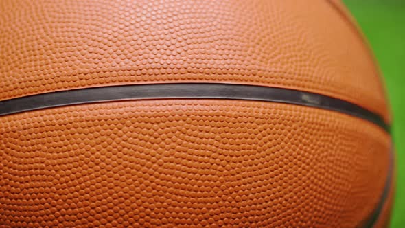 Basketball Ball Close Up on Dark Black Background alt