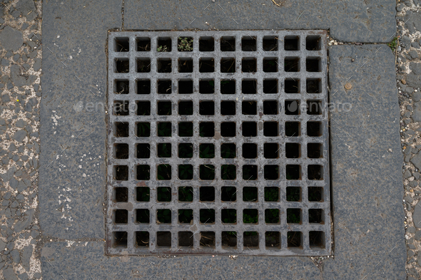 Manhole in the Roman forum. Italy, Rome. Stock Photo by composter-box