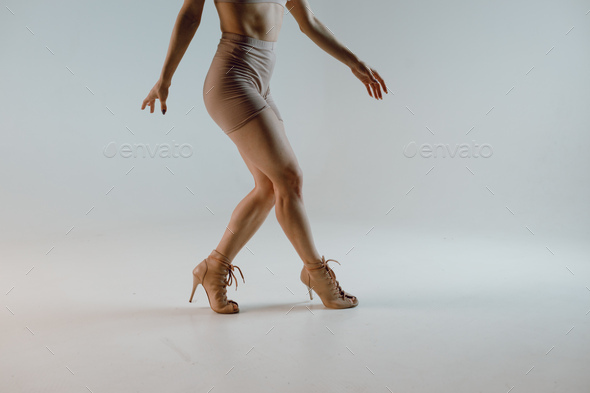 Young woman dancer dancing high heels dance.