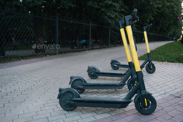 City transport electric scooter - eco-friendly means of transportation, rent on the city street
