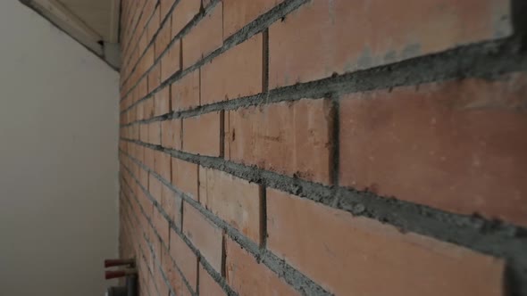 Newly Built Brown Brick Wall
