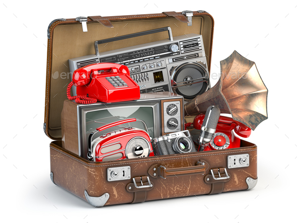 Vintage electrical and electronic appliances in an old suitcase.