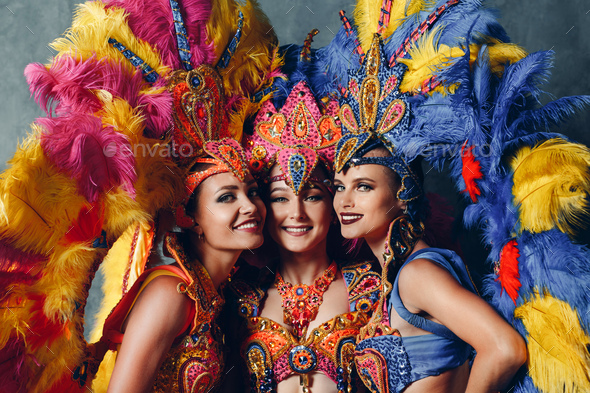Three Woman in brazilian samba carnival costume with colorful