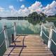 Small pier in a lake captured on a beautiful sunny day - PhotoDune Item for Sale