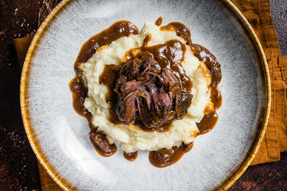 Slow Cooked Beef Cheeks In Red Wine Sauce With Mashed Potato Dark