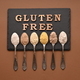 Gluten free text and spoons of various gluten free flour. Flat lay, top. - PhotoDune Item for Sale
