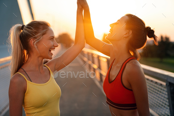 Group of fit women exercising together outdoor. People sport healthy lifestyle concept