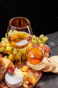 Wine and cheese on the table
