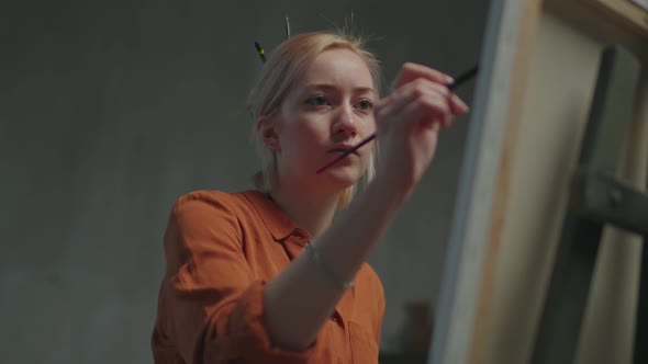 Talented Artist Drawing Artwork in Art Workshop alt