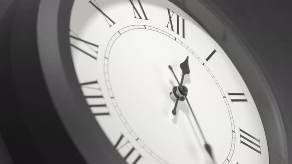 Latin Clock Face In Time Lapse On Dark Grey Wall  alt