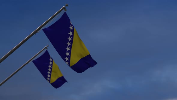 Bosnia And Herzegovina  Flags In The Blue Sky - 4K alt