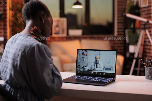 Woman talking with doctor on videocall, telehealth concept - Stock Photo - Images