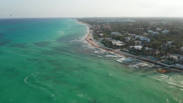 Aerial View of Sandy Beach Along the Seashore in Playa Del Carmen alt