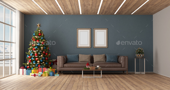 Modern living room with Christmas tree and leather sofa - Stock Photo - Images