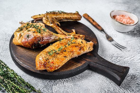 Butchered roast goose, breast fillet, wing, leg. White background. Top ...