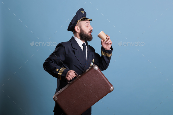 Airplane captain in professional airline uniform running late