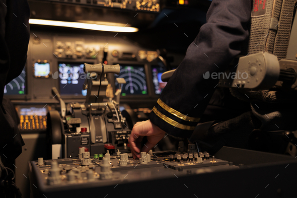 Aircrew member using control panel command on dashboard