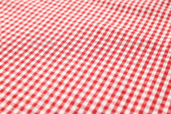 Red and white checkered tablecloth on whole background Stock Photo by