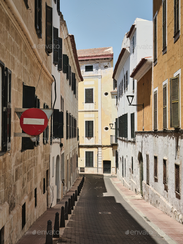 One-way narrow street in Mahon, Menorca, Spain