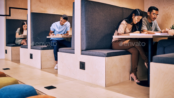 An inspiring space to work in. Shot of creatives working in cubicles.