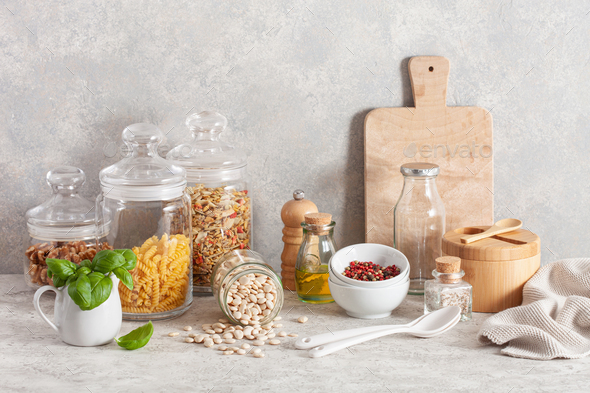 kitchen utensils on modern simple counter, kitchenware jars with