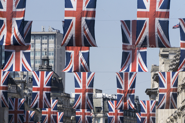 Union Jack flags hang in Central London in preperation for the royal wedding