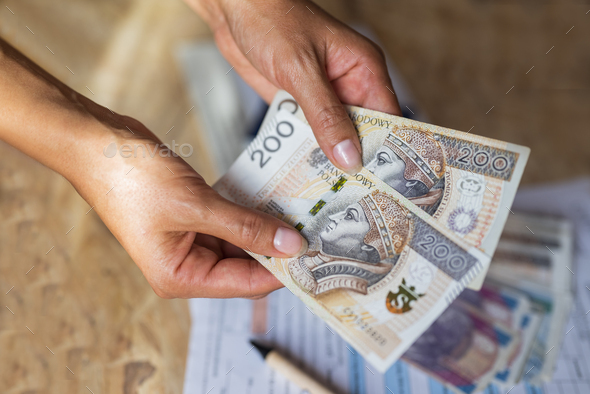 The Girl Holds In Her Hands Banknotes Money Polish Zlotys And Pennies