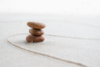 Japanese Zen Garden with Pebble with Line on Sand