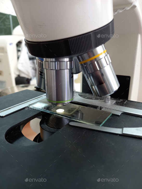 Photo of light microscope objectives of different magnifications. Stock